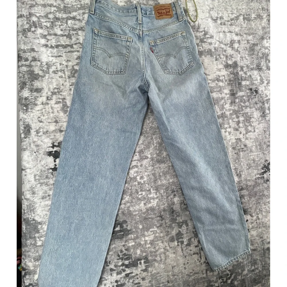 Levi's Women 24x31 '94 Baggy Jeans Light Wash Blue High Rise‎ Denim Retro